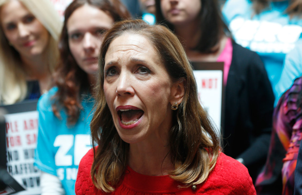State Assemblywoman Amy Paulin (D) speaks during a rally supporting women's rights legislation in Albany, New York, on June 17, 2014. (AP/Mike Groll)