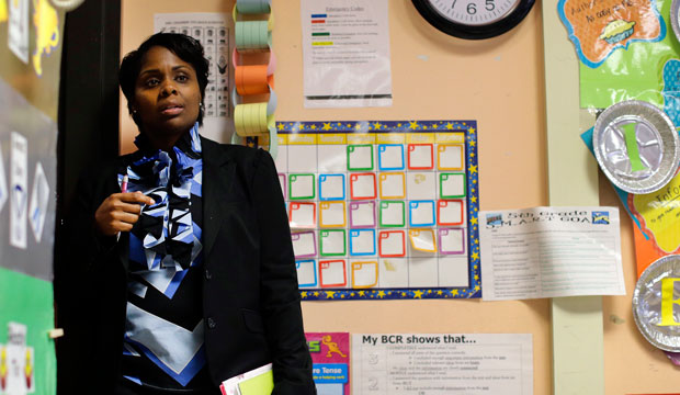 Tamara Hanson, principal of John Eager Howard Elementary School in Baltimore, looks in on a class in April 2013. (AP/Patrick Semansky)