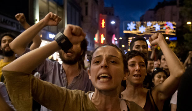 People chant slogans as they try to reach Gezi Park in Istanbul, Turkey, in July 2013. (AP/Vadim Ghirda)