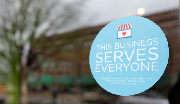 A window sticker on a downtown Indianapolis business shows its objection to a discriminatory bill passed by the Indiana Legislature on March 25, 2015. (AP/Michael Conroy)