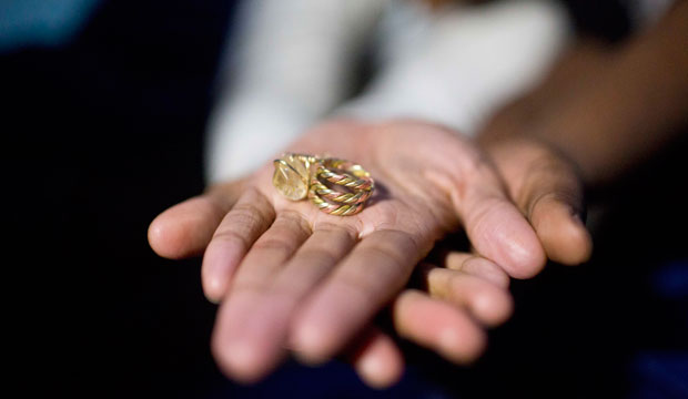 Tori Sisson holds out her and Shanté Wolfe's wedding rings in Montgomery, Alabama, on the day that Alabama Chief Justice Roy Moore ordered probate judges to refuse to issue same-sex marriage licenses. (AP/Brynn Anderson)