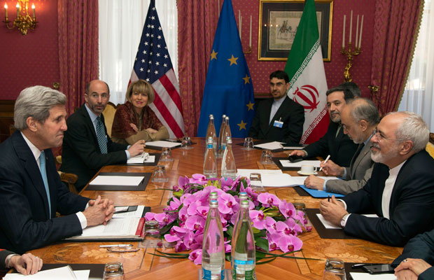 U.S. Secretary of State John Kerry and Iran's Foreign Minister Mohammad Javad Zarif discuss Iran's nuclear program in Lausanne, Switzerland. (AP/Brian Snyder)