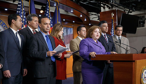 Members of the Congressional Hispanic Caucus hold a news conference to discuss their efforts to implement President Barack Obama's immigration executive action on the expansion rollout of the Deferred Action for Childhood Arrivals program, February 13, 2015, on Capitol Hill in Washington. (AP/J. Scott Applewhite)
