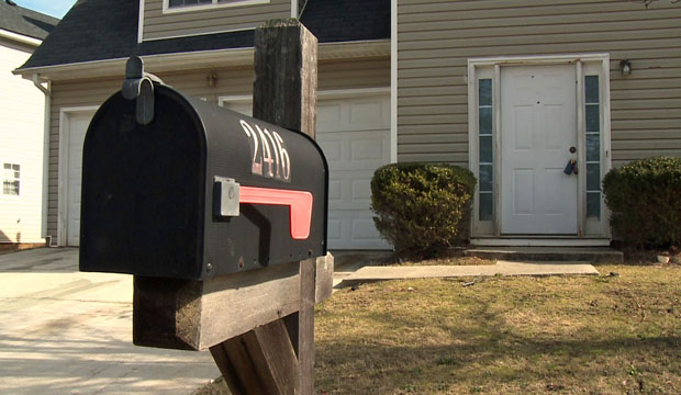 The exterior of a Georgia home, which was purchased by a company that leases properties to tenants who have an option to buy once they secure a mortgage, is shown in March 2009. (AP/Jason Bronis)