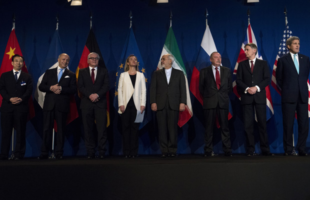 Representatives from world powers are seen in Lausanne, Switzerland, on April 2, 2015, after Iran nuclear program talks finished. (AP/Brendan Smialowski)