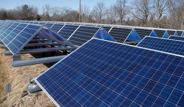 Solar panels that are part of the Wright-Hennepin Cooperative Electric Association's community gardens are shown in Rockford, Minnesota. (AP/Jim Mone)