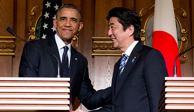 President Barack Obama, left, and Japanese Prime Minister Shinzo Abe shake hands at the conclusion of their joint news conference at the Akasaka State Guest House in Tokyo, April 24, 2014. (AP/Carolyn Kaster)