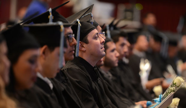 Students participate in commencement exercises. (AP/Brad Doherty)