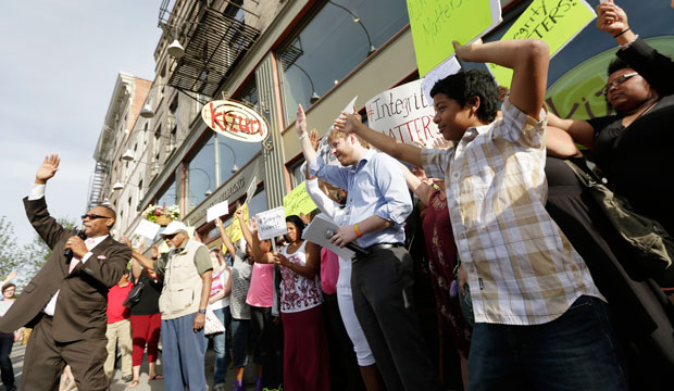 Dennis Mitchell speaks during a demonstration calling for local NAACP chapter president Rachel Dolezal to step down on June 15, 2015, in Spokane, Washington. (AP/Young Kwak)