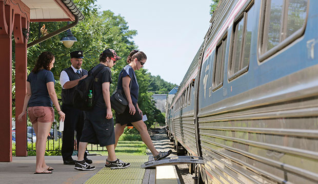 Passengers board an Amtrak train at a station in Exeter, New Hampshire, July 2012. (AP/Charles Krupa)