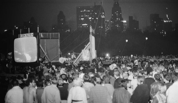 A crowd watches in Central Park, New York City, as the Apollo 11 crew lands on the moon on July 20, 1969. (AP/Marty Lederhandler)