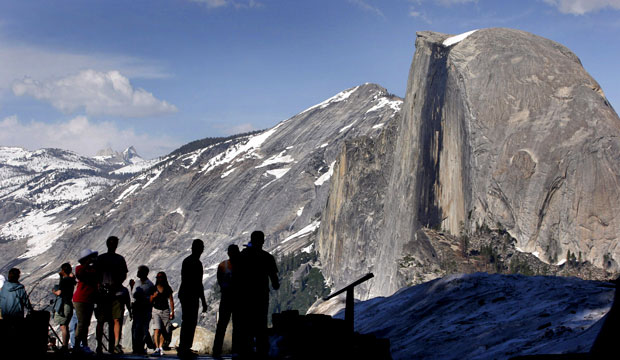 Visitors view Half Dome from Glacier Point at Yosemite National Park, California. (AP/Dino Vournas)