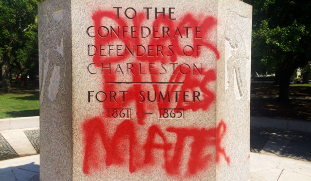 A statue memorializing the Confederacy spray-painted with the message 