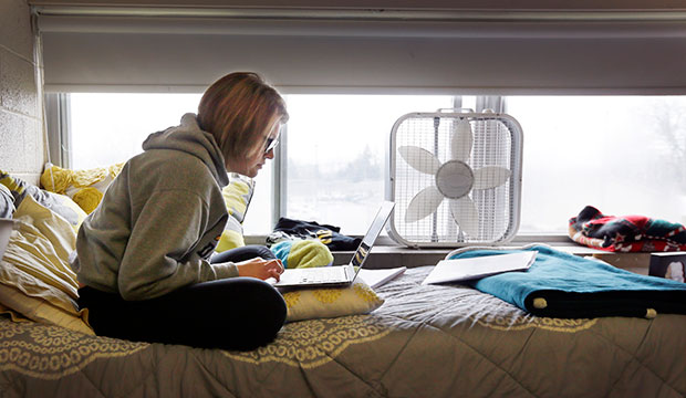 A college student studies in her dorm, December 2014. (AP/Carlos Osorio)