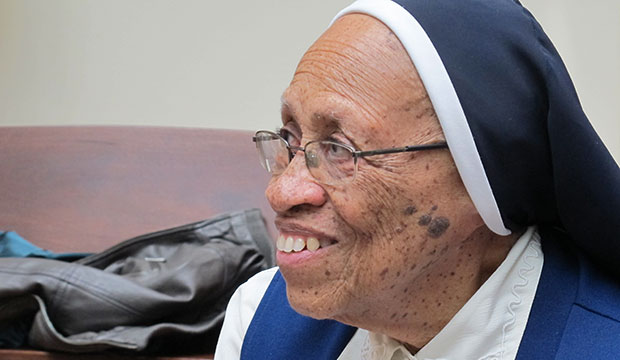 A Roman Catholic nun discusses her elder care. (AP/Jim Fitzgerald)