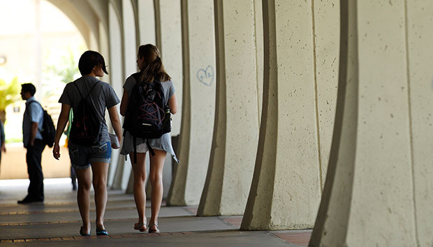 Students walk on their college campus, June 2011. (AP/Gregory Bull)