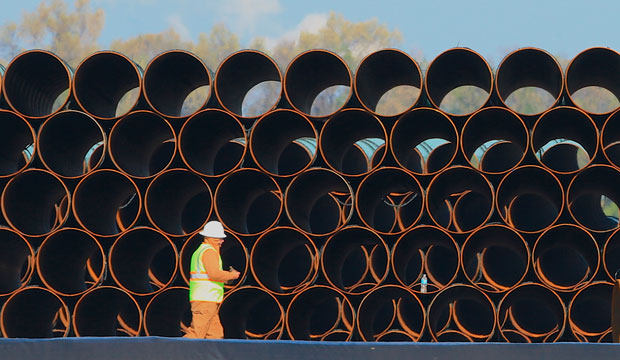 Pipes for the proposed Dakota Access oil pipeline are stacked at a staging area in Worthing, South Dakota, on May 9, 2015. (AP/Nati Harnik)