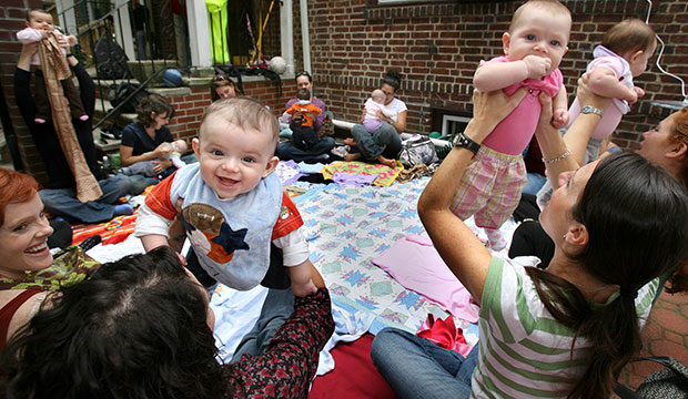 Parents and their babies enjoy a music appreciation and therapy lesson for infants in 2008. (AP/Craig Ruttle)