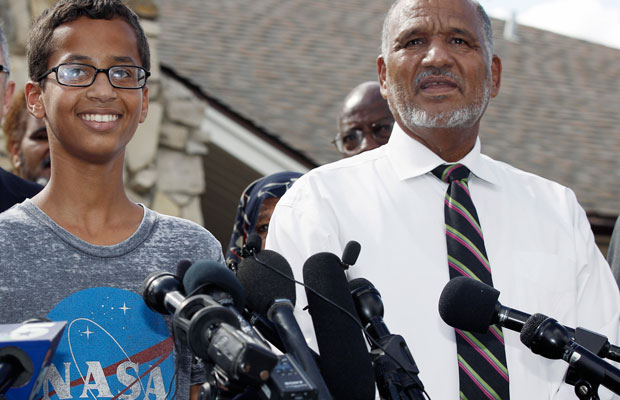 Ahmed Mohamed and his father thank supporters during a news conference in Irving, Texas. Ahmed was arrested last week after a teacher thought a homemade clock he built was a bomb. (AP/Brandon Wade)