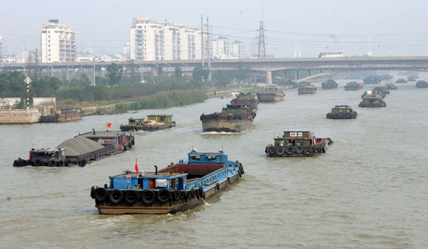 Barges navigate on the Grand Canal in China, plying a trade route built 2,500 years ago, October 2010. (AP/Anonymous)