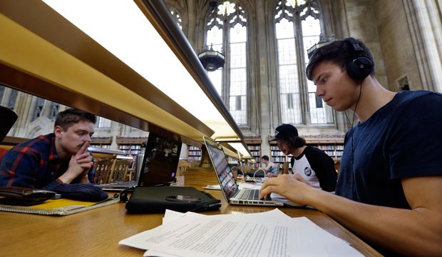 University of Washington students study at the school's Suzzallo Library in Seattle in April 2013. (AP/Elaine Thompson)