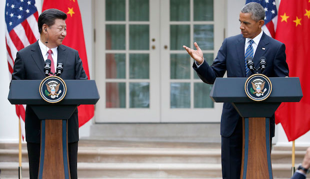 President Barack Obama gestures toward Chinese President Xi Jinping during a news conference at the White House on September 25, 2015. (AP/Evan Vucci)