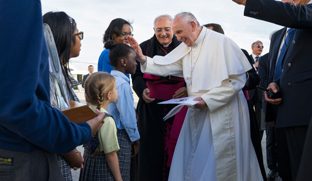 Children greet Pope Francis upon his arrival at John F. Kennedy International Airport on Thursday, September 24, 2015, in New York. (AP/Craig Ruttle)