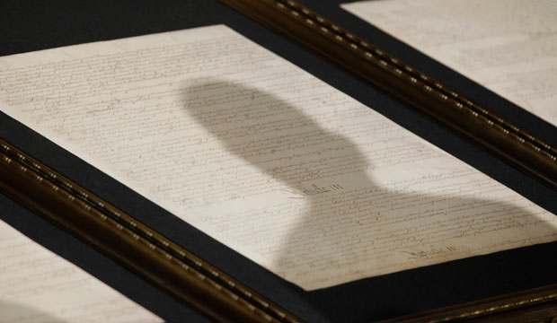 A shadow is cast on the Constitution, May 2009. (AP/Charles Dharapak)