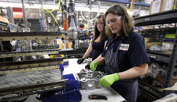 In this November 16, 2012 photo, Suzie Warner works on an assembly line at Generac Power Systems, Inc. in Whitewater, Wisconsin. (AP/Nam Y. Huh)