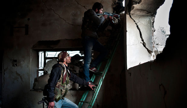 Kurdish fighters take up positions to fight ISIS militants in Kobani, Syria, on November 1, 2014. (AP/Jake Simkin)