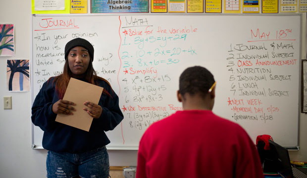 In this May 18, 2015 photo, Bre'Ana Henderson, 17, left, speaks in a classroom in Los Angeles. (AP/Jae C. Hong)