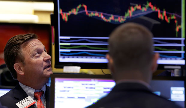 Specialist Thomas Facchine works on the floor of the New York Stock Exchange on September 1, 2015. (AP/Richard Drew)