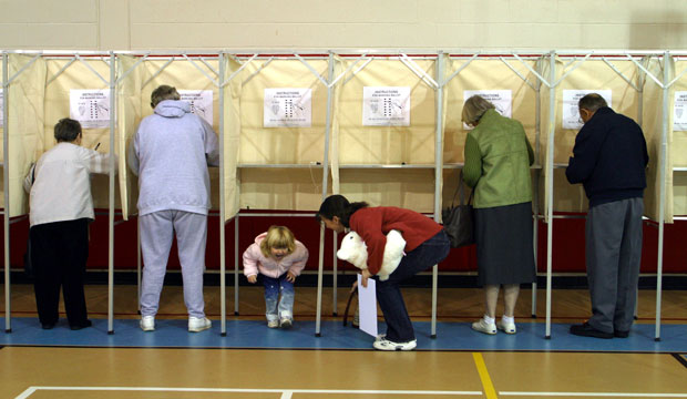 A voting booth in a community center, November 2004. (AP/Julia Cumes)
