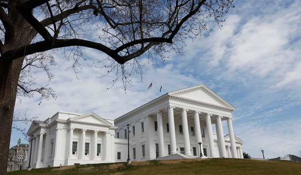 Flags wave on the roof of the Virginia state Capitol in Richmond, Virginia, in February 2011. (AP/Steve Helber)