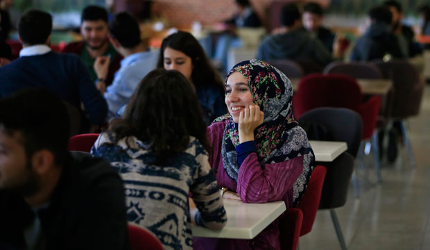 Students sit in the cafeteria of Fatih University in Istanbul, Turkey, October 2, 2015. (AP/Lefteris Pitarakis)