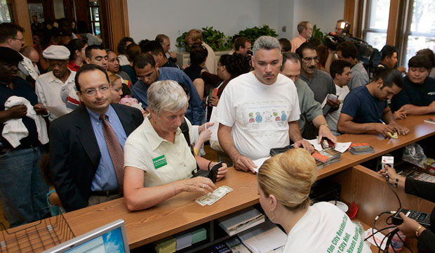 Applicants for the Municipal ID card crowd the ID card office in City Hall in New Haven, Connecticut, July 24, 2007. (AP/Bob Child)