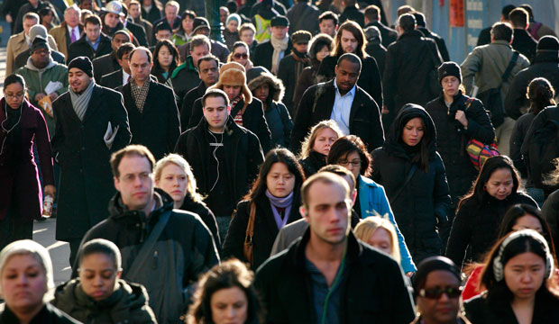 Acrowd of people walk during the morning rush hour in New York, 2010. (AP/Mark Lennihan)