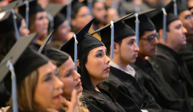 Graduating students listen to a commencement address in May 2015. (AP/Brad Doherty)
