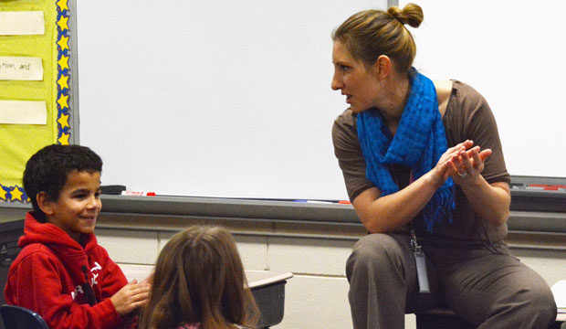 In this February 4, 2016, photo, fourth-grade teacher Jessica Ries leads a cheer to prepare her Hayward Elementary School students for a writing assessment test in Sioux Falls, South Dakota. (AP/Dirk Lammers)