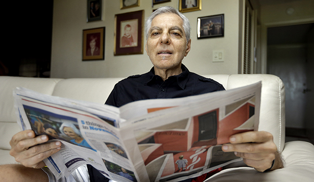 A man looks over a Medicare brochure at his home in Seminole, Florida, November 2015. (AP/Chris O'Meara)