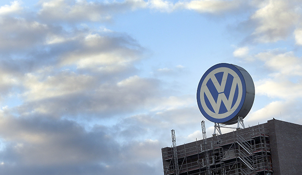 A giant logo of the German car manufacturer Volkswagen is pictured on top of a company's factory building in Wolfsburg, Germany, September 2015. (AP/Michael Sohn)