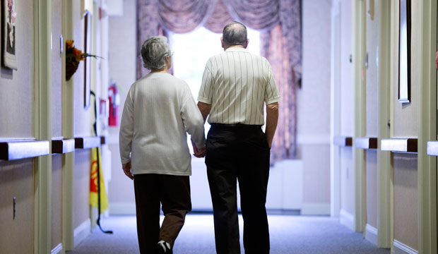 Decima Assise and Harry Lomping walk the halls of The Easton Home on November 6, 2015, in Easton, Pennsylvania. (AP/Matt Rourke)