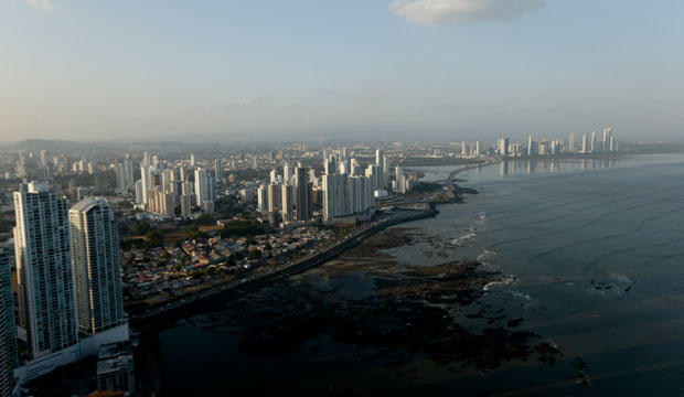 The setting sun lights up the Panama City skyline, April 4, 2016. (AP/Arnulfo Franco)