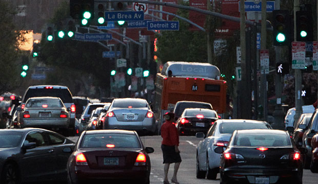 Stoplights and traffic are seen on Wilshire Boulevard in Los Angeles, April 2013. (AP/Reed Saxon)
