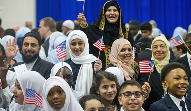 Children from Al-Rahmah school and other guests react after seeing President Barack Obama during his visit to the Islamic Society of Baltimore, February 3, 2016. (AP/Pablo Martinez Monsivais)