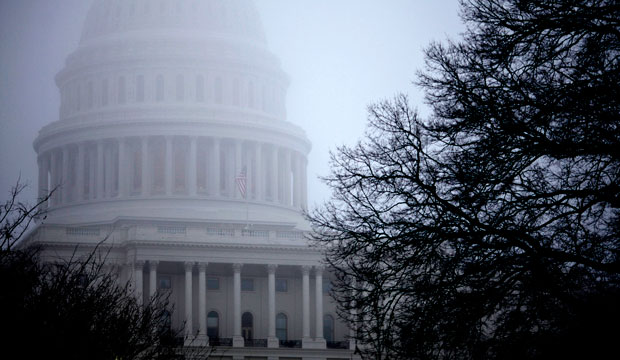 Fog obscures the Capitol dome in Washington, D.C., on December 10, 2012. (AP/J. Scott Applewhite)