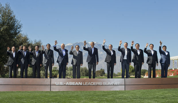 President Barack Obama, center, and leaders of ASEAN wave as they pose for a group photo at the Annenberg Retreat at Sunnylands in Rancho Mirage, California, on February 16, 2016. (AP/Pablo Martinez Monsivais)