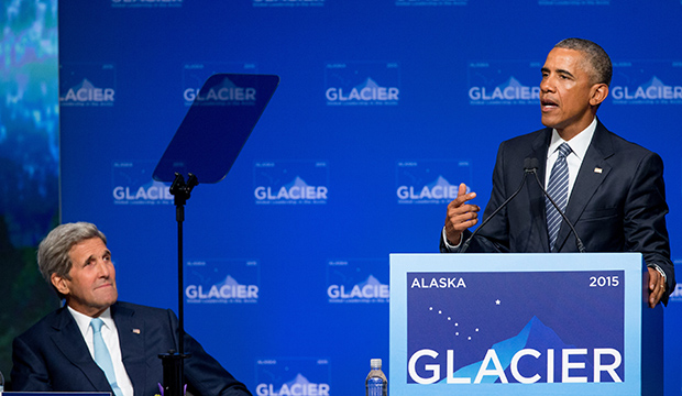 President Barack Obama, right, accompanied by Secretary of State John Kerry, left, speaks at the Global Leadership in the Arctic: Cooperation, Innovation, Engagement, and Resilience, or GLACIER, Conference in Anchorage, Alaska, August 31, 2015, attended by Nordic foreign ministers, native leaders, and dignitaries from 20 countries. President Obama opened a three-day trip to Alaska, where he witnessed and warned of a warming world and issued an urgent call to action on climate change. (AP/Andrew Harnik)