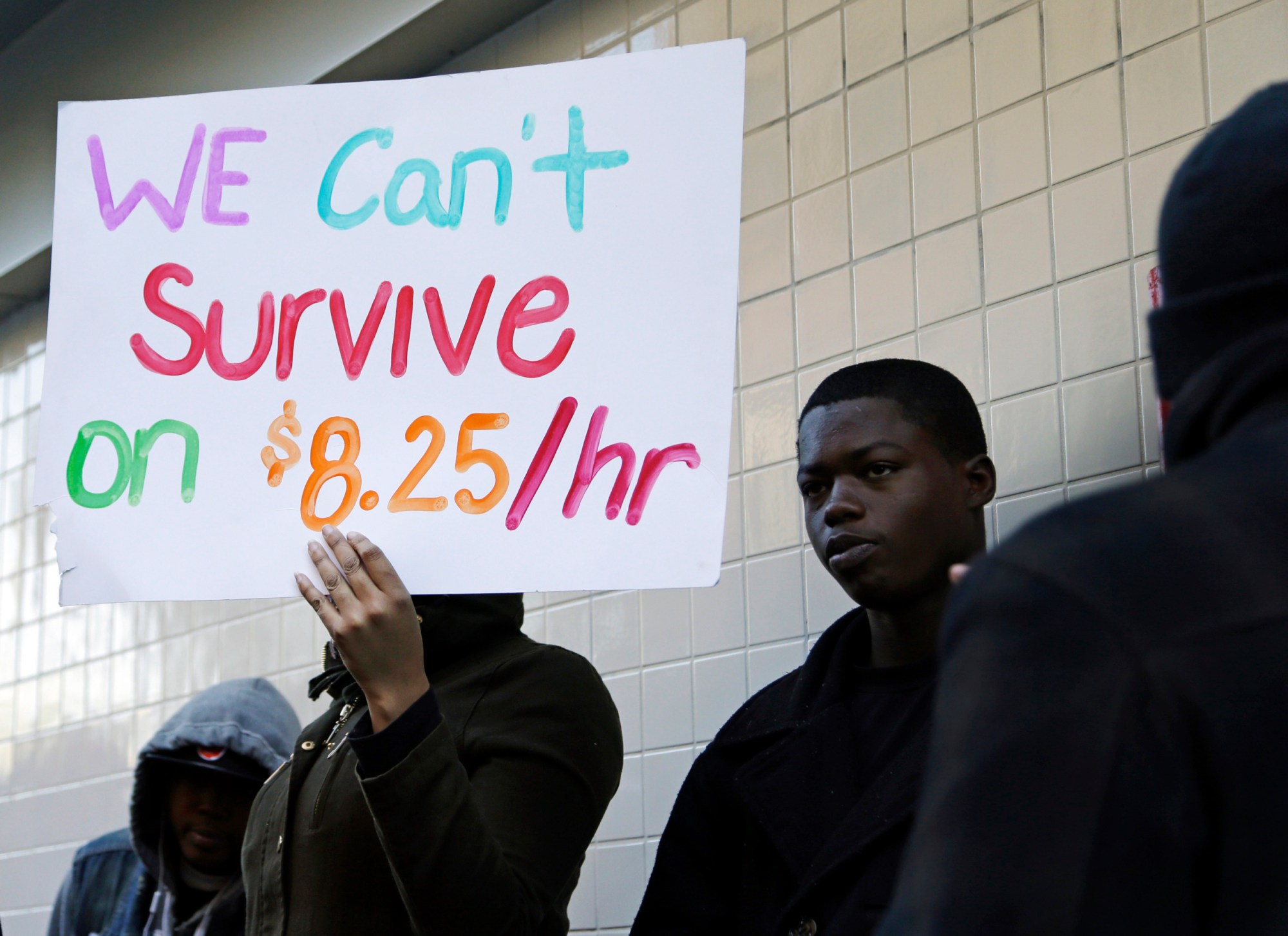 Protestors demonstrate outside of a McDonald's restaurant in Oakland, California, in December 2013. (AP/Ben Margot)