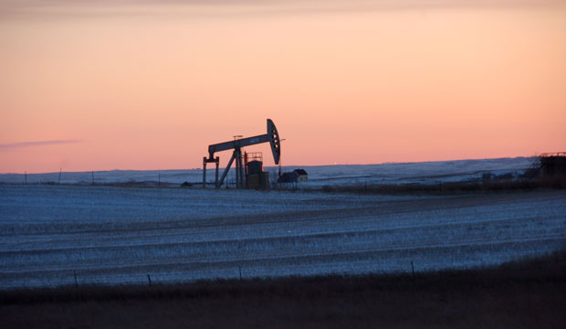 A pump jack for pulling oil from the ground is seen near New Town, North Dakota, on February 25, 2015. (AP/Matthew Brown)